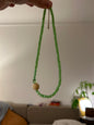 Collier ras du cou perles de verre, vert et beige
